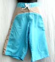 Holiday travel swim wear online boutique supplies Aloha beach shorts in fun blue and tan colors with drawstring waistband