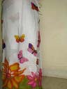 Summer leisure wear wholesale importer manufactures Tropical butterfly and flower design on crafted wrap around