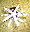Artisan designed home ornament shopping factory from China, Starfish hanging decor with purple colored seashells and straw ribbon