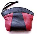 Wholesale handbag and accessory distributor imports ladies fashion purse from imitation leather with zippered pocket and wrist strap